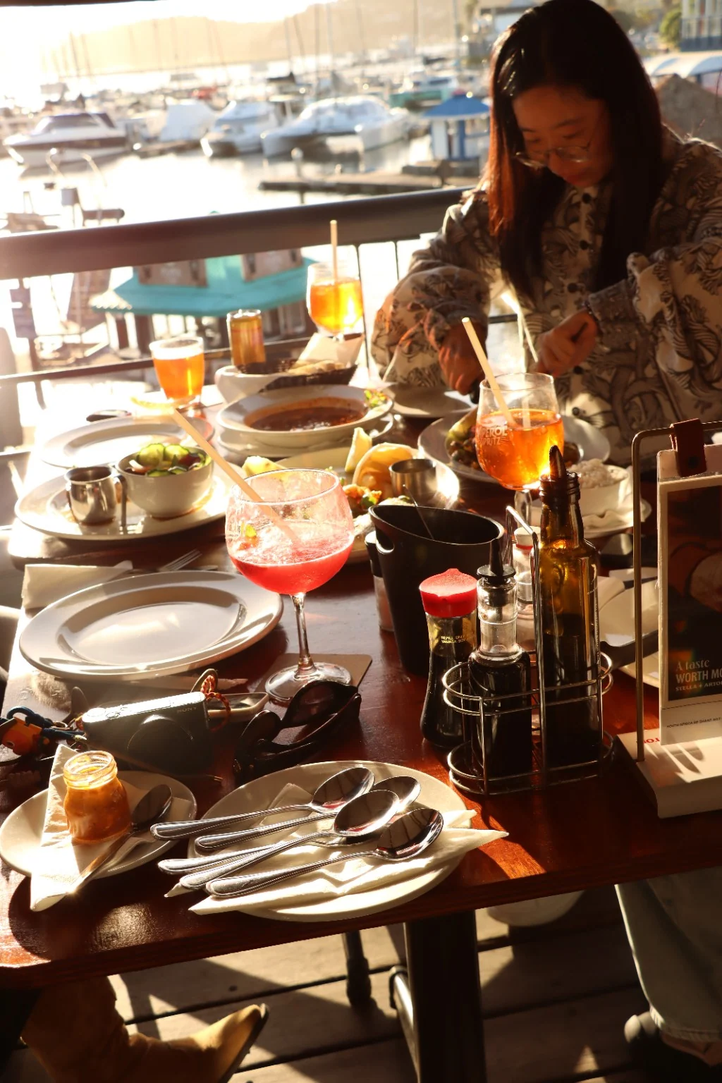 Lunch and drinks at a table overlooking Knysna Waterfront
