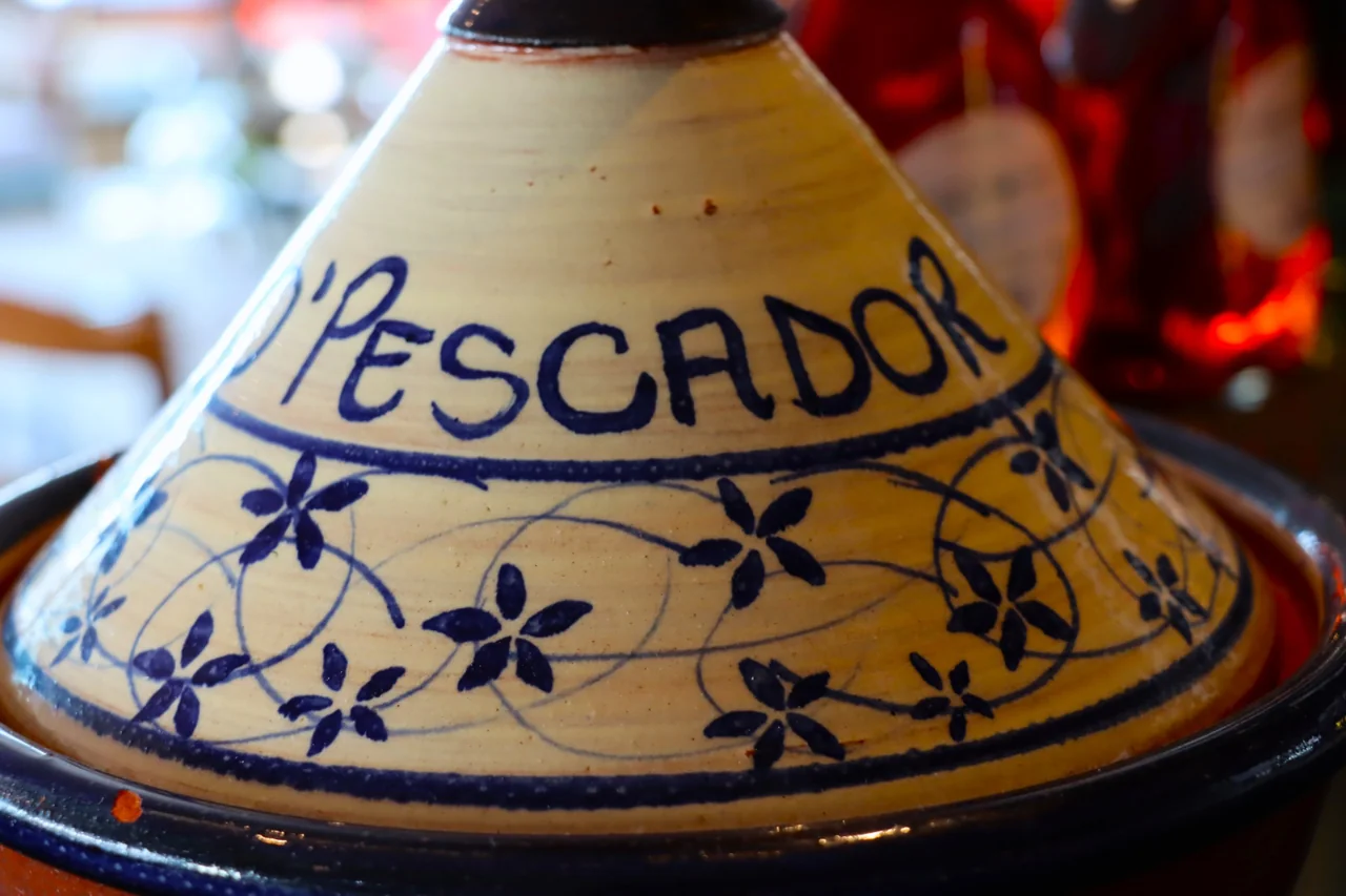 Hand-painted Portuguese pottery bearing the O Pescador name