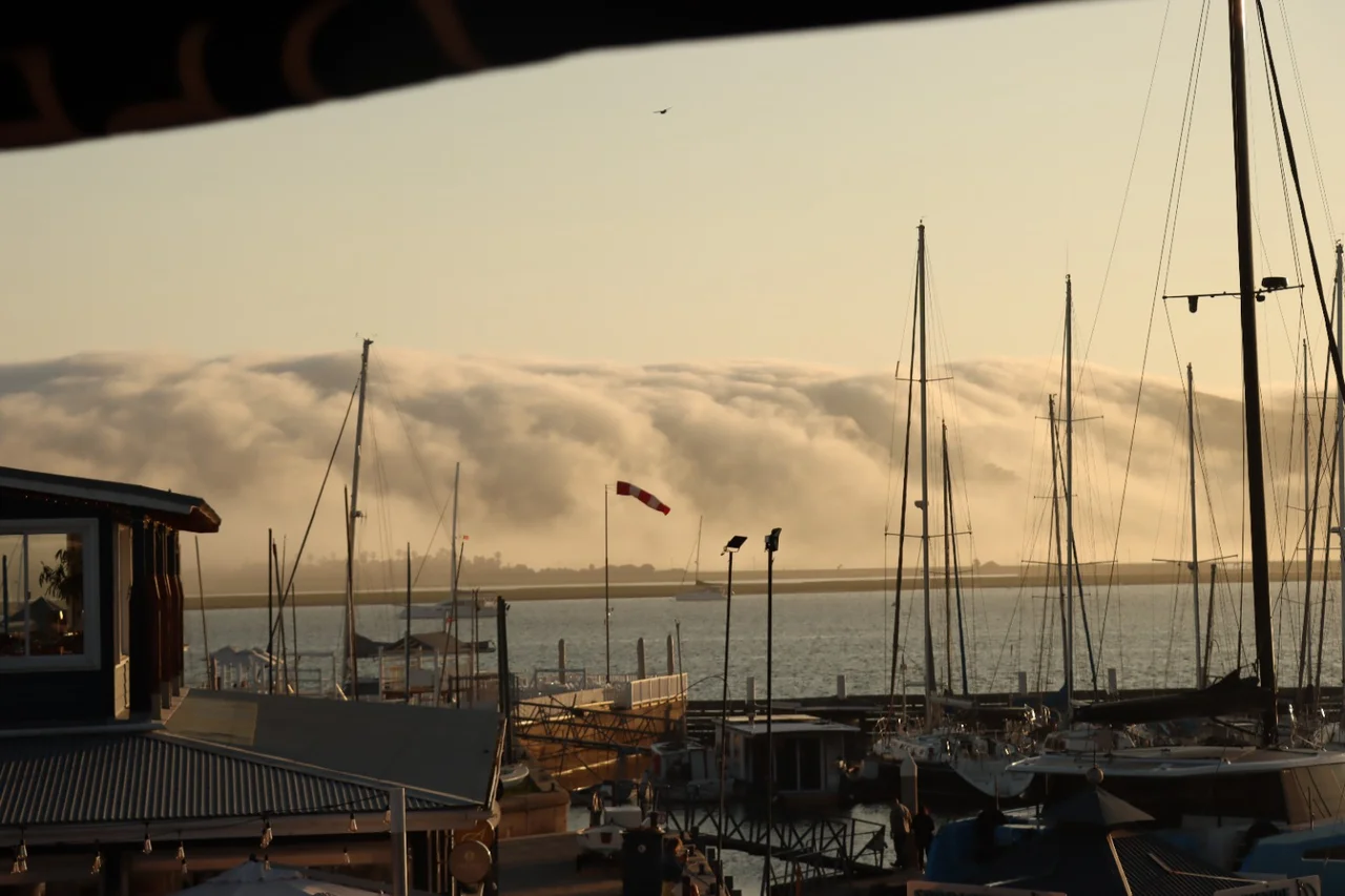 Clouds rolling across the hills beyond the Knysna Waterfront