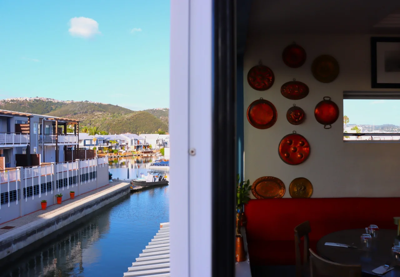 Sunshine on Knysna Waterfront, seen from inside O Pescador